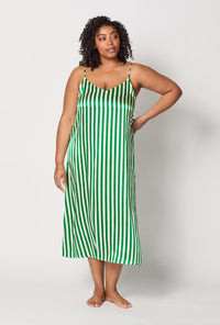 A lady wearing plus size Green and White Woven Washable Silk Chemise front view