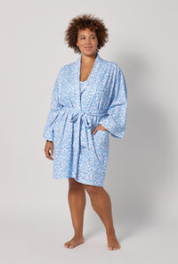 A lady wearing plus Something Blue Banded Collar Stretch Jersey Robe