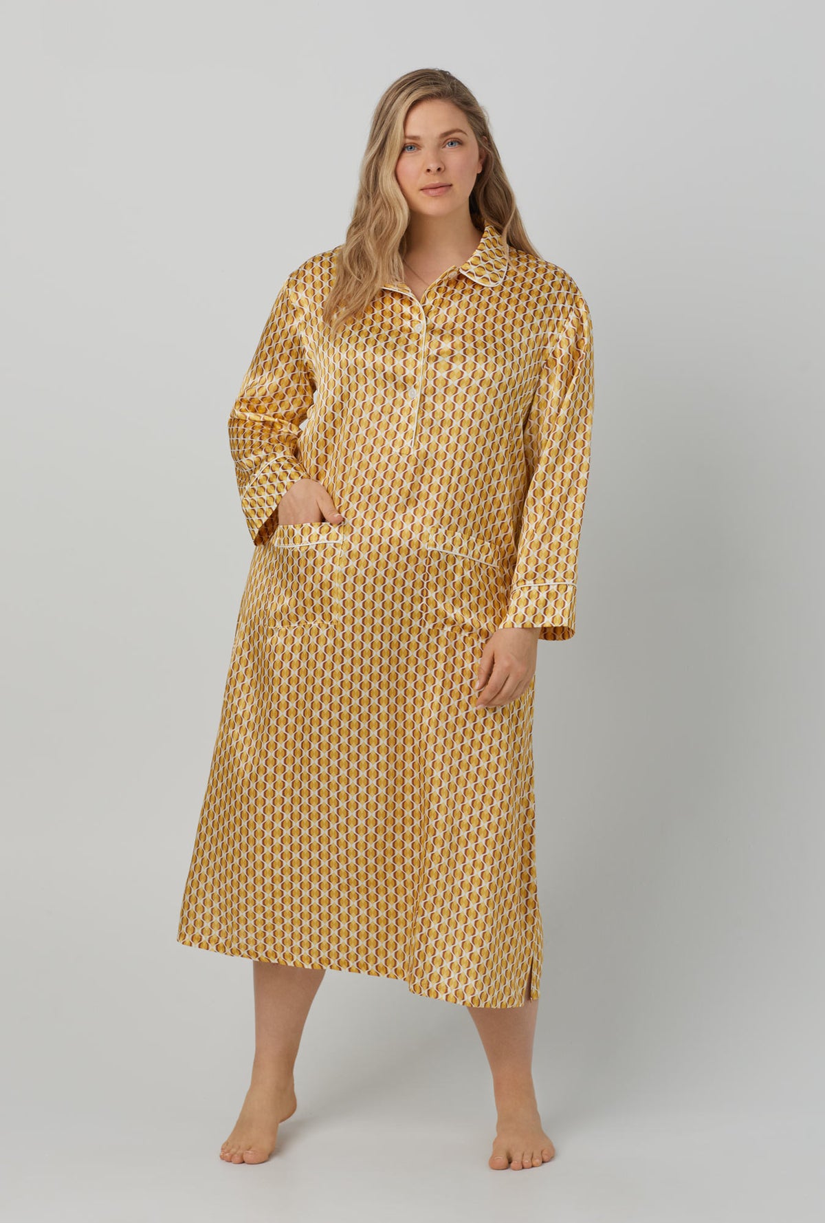 A lady wearing yellow Maxi Half Button Washable Silk Sleepshirt with Prize Geo print