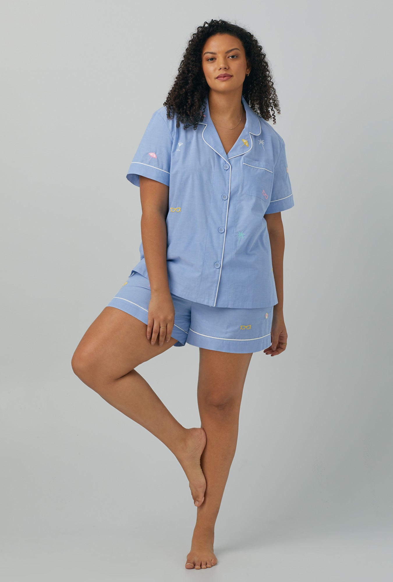 A lady wearing blue Short Sleeve Classic Woven Cotton Poplin Shorty PJ Set with Chambray print