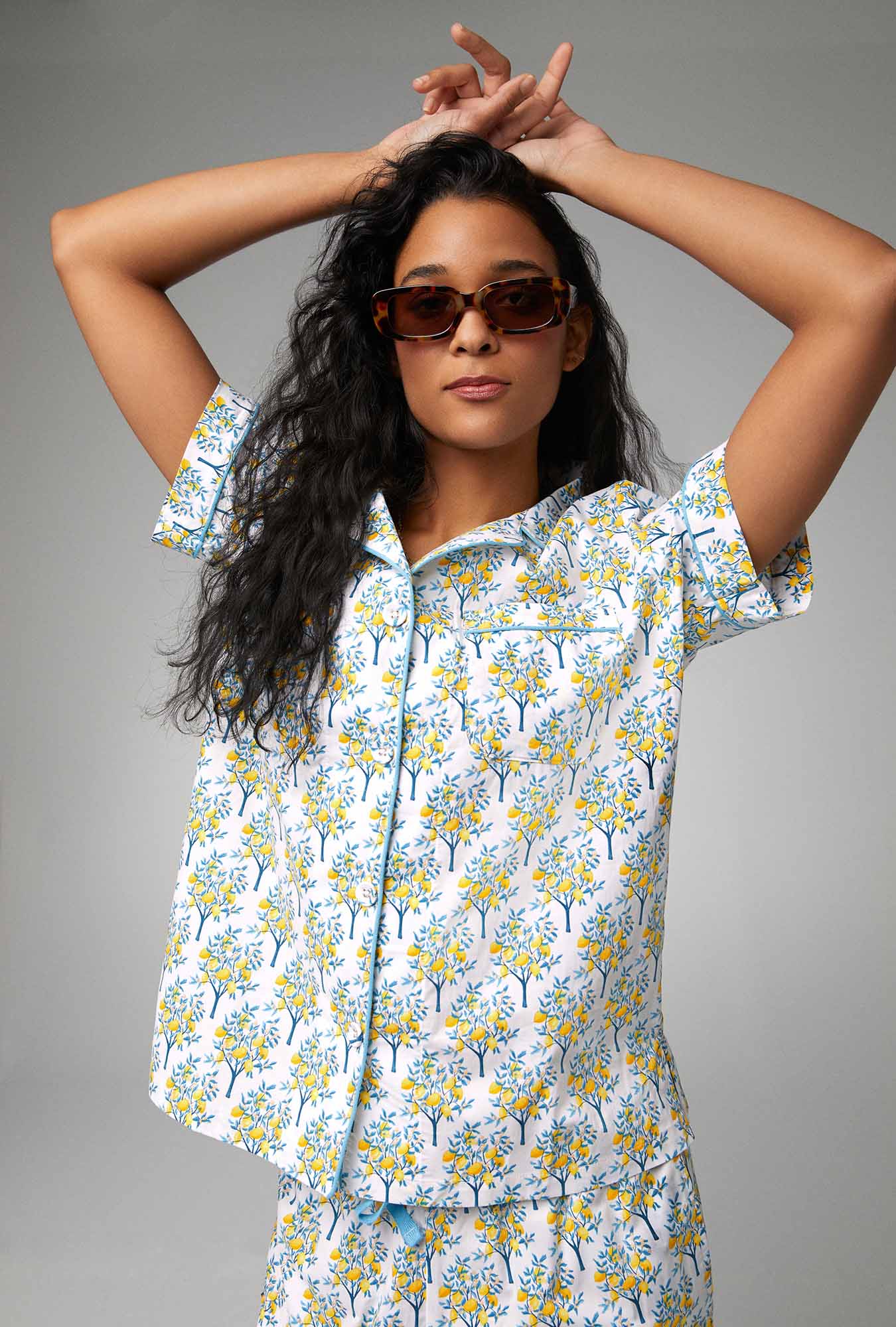A lady wearing white Short Sleeve Classic Woven Cotton Poplin Cropped PJ Set with Lemon Trees print