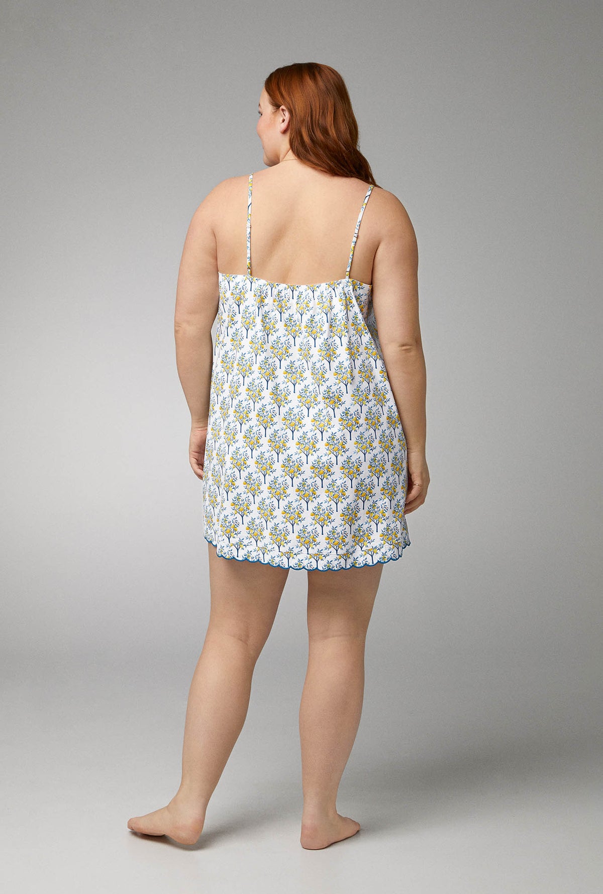 A lady wearing Woven Cotton Poplin Scallop Chemise with Lemon Trees  print