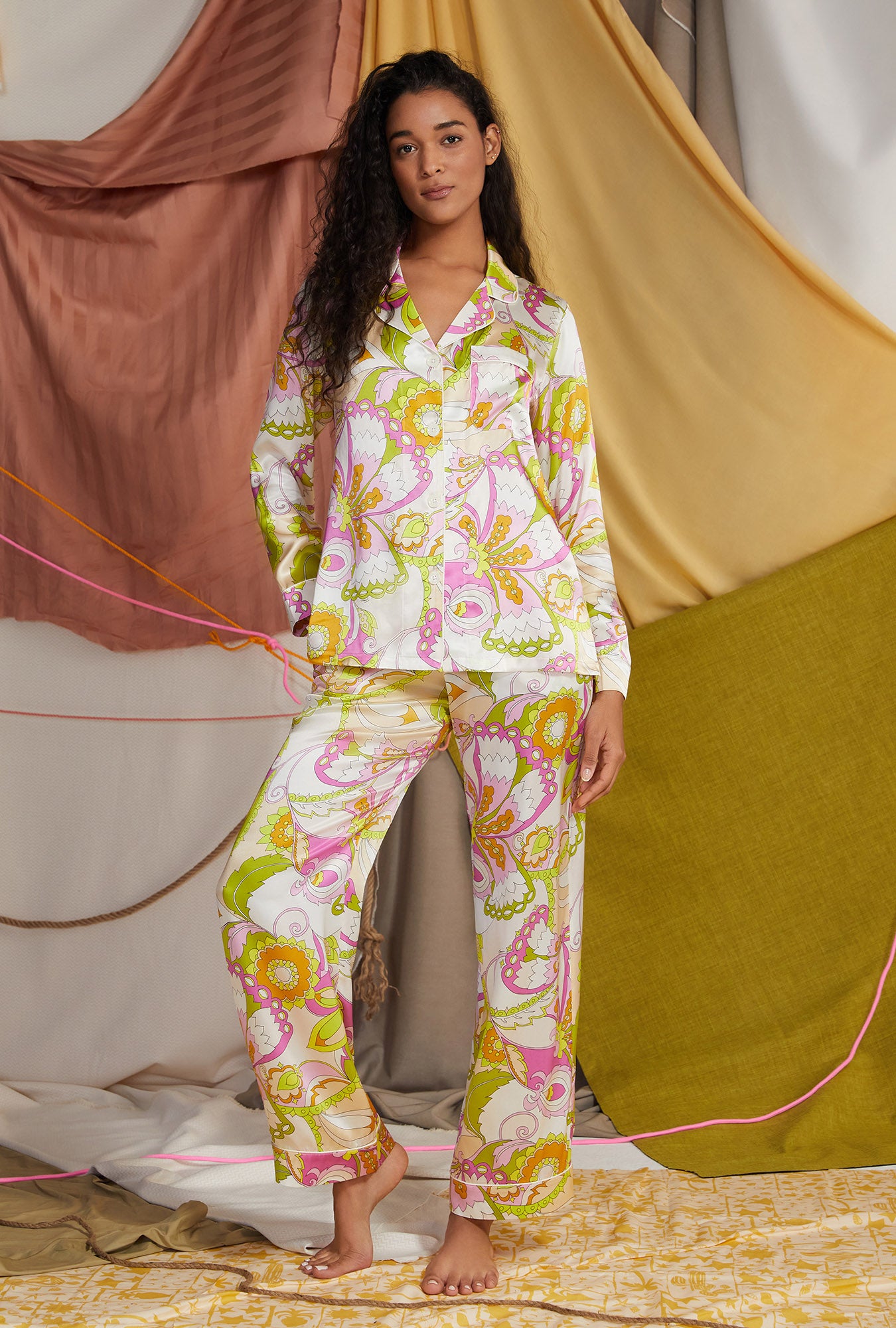 A lady wearing floral long sleeve classic washable pj set with trina turk print