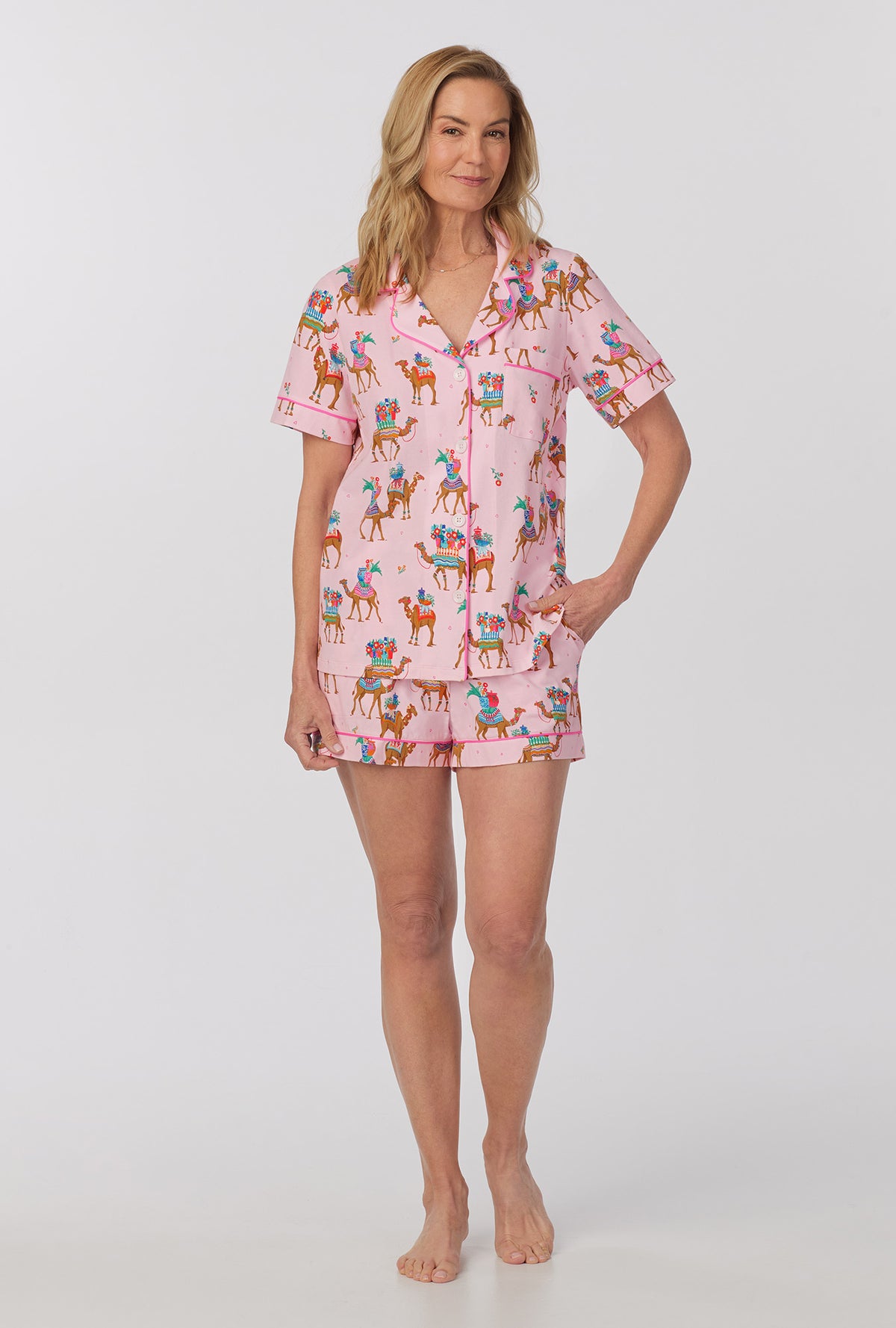 A lady wearing pink Short Sleeve Classic Shorty Stretch Jersey PJ Set with fancy camels print