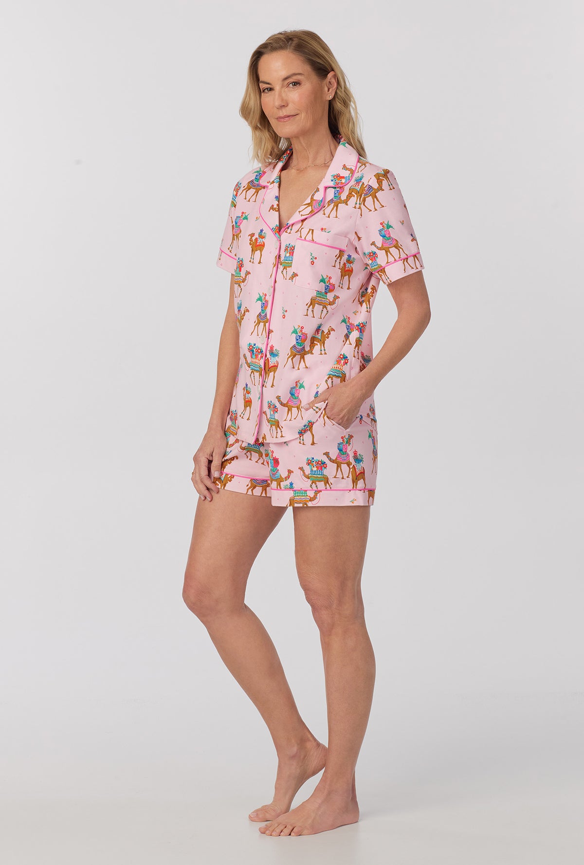 A lady wearing pink Short Sleeve Classic Shorty Stretch Jersey PJ Set with fancy camels print