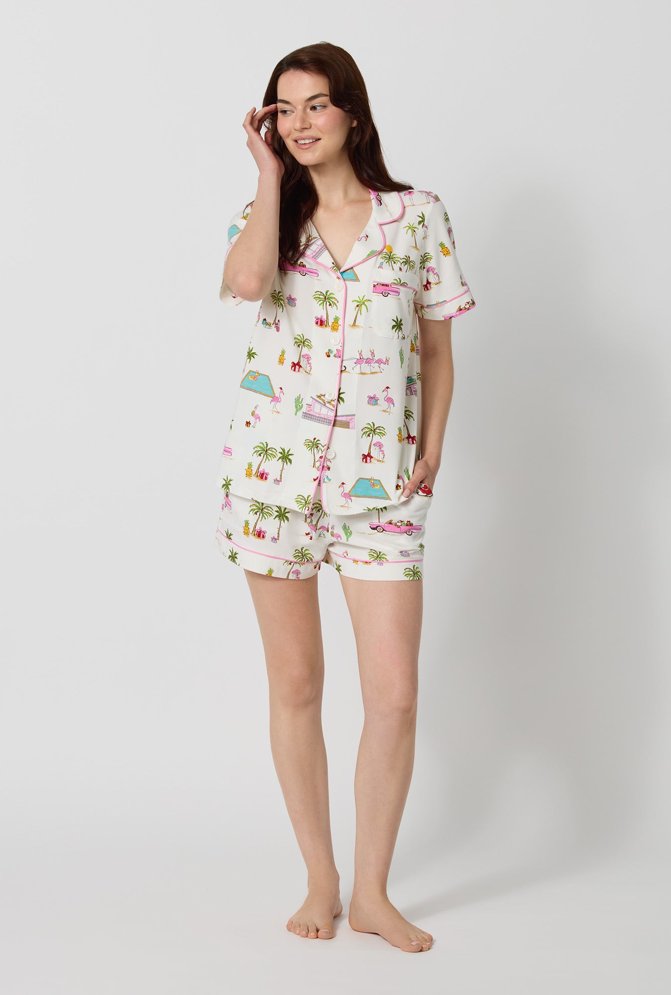 A lady wearing Festive Flamingos Short Sleeve Classic Shorty Stretch Jersey Pj Set looking side