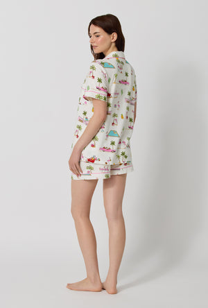 A lady wearing Festive Flamingos Short Sleeve Classic Shorty Stretch Jersey Pj Set back view