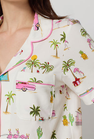 A lady wearing Festive Flamingos Short Sleeve Classic Shorty Stretch Jersey Pj Set closer look