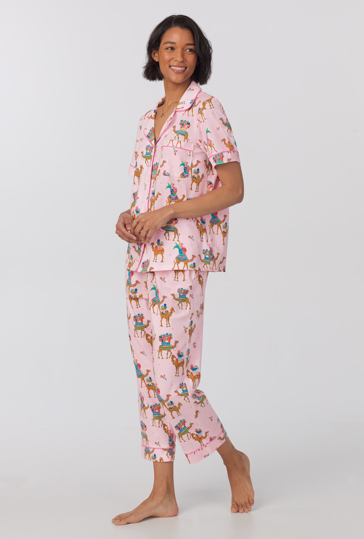 A lady wearing Short Sleeve Classic Stretch Jersey Cropped PJ Set with fancy camels print