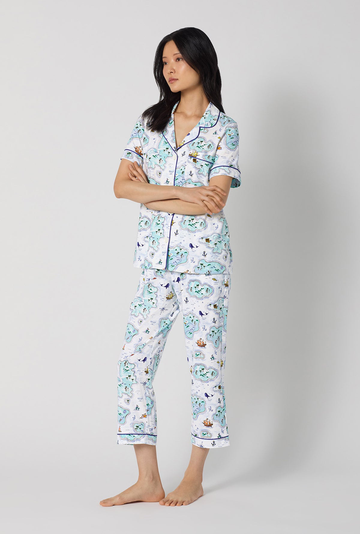 A lady wearing Treasure Hunt Short Sleeve Classic Stretch Jersey Cropped Pj Set looking side