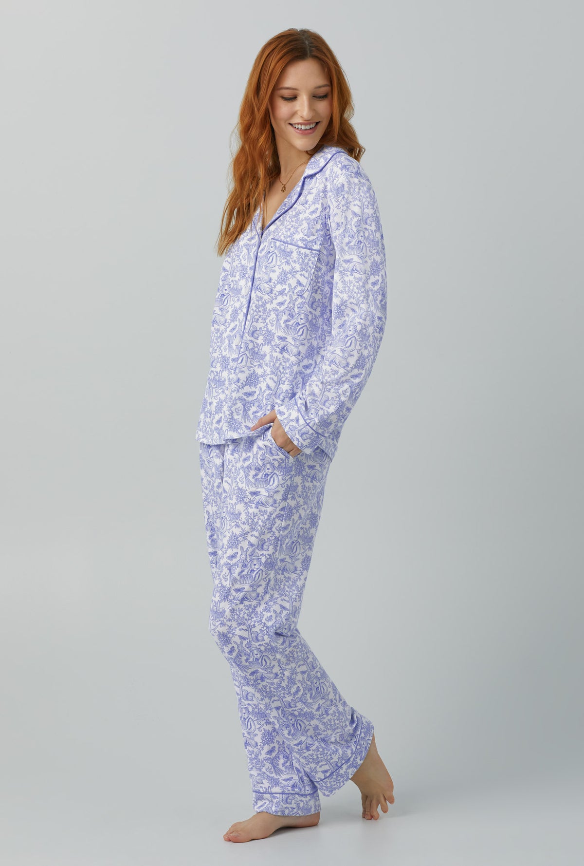 A lady wearing Long Sleeve Classic Stretch Jersey PJ Set with Fairytale Forest print