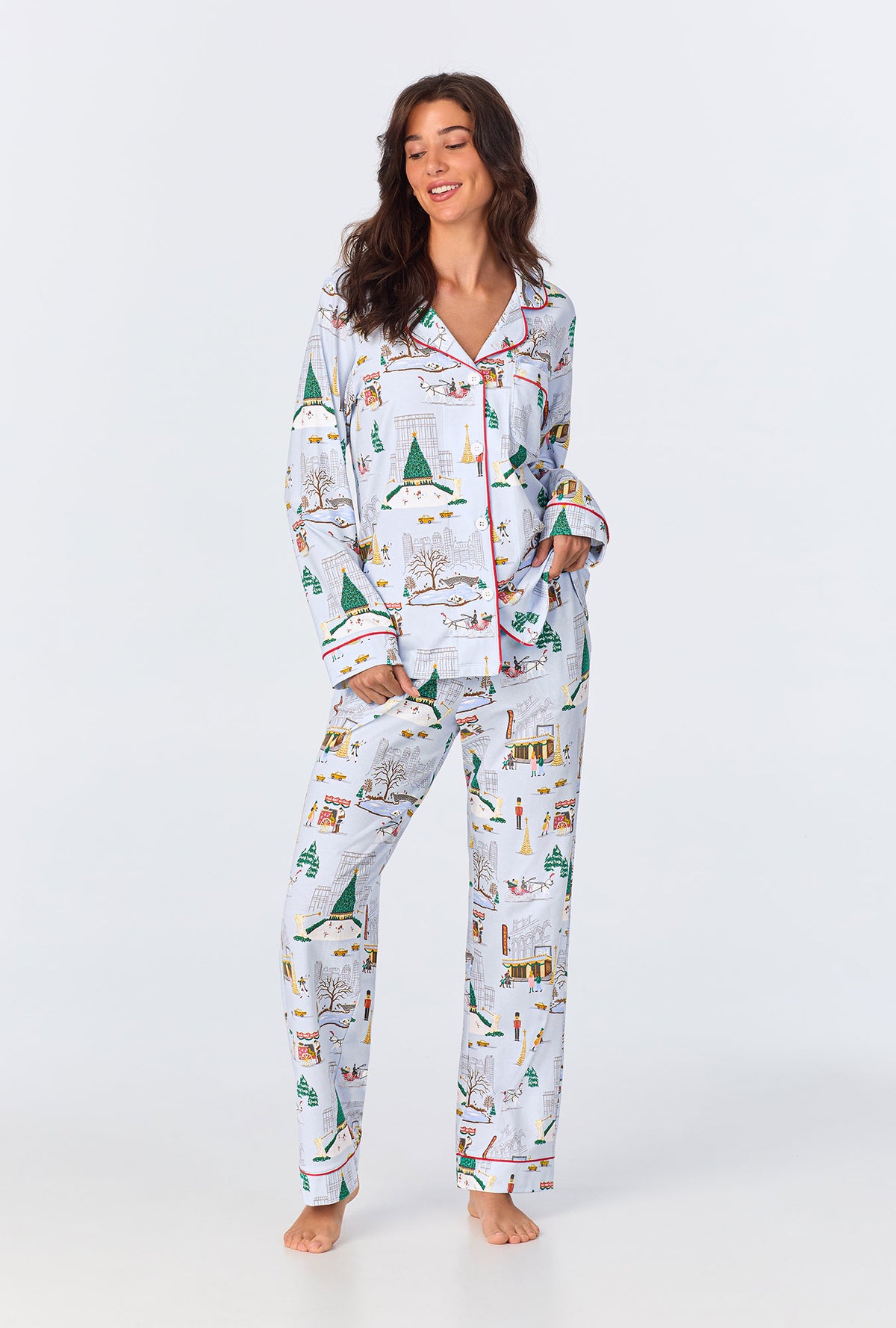 A lady wearing Holiday In The City Long Sleeve Classic Stretch Jersey PJ Set
