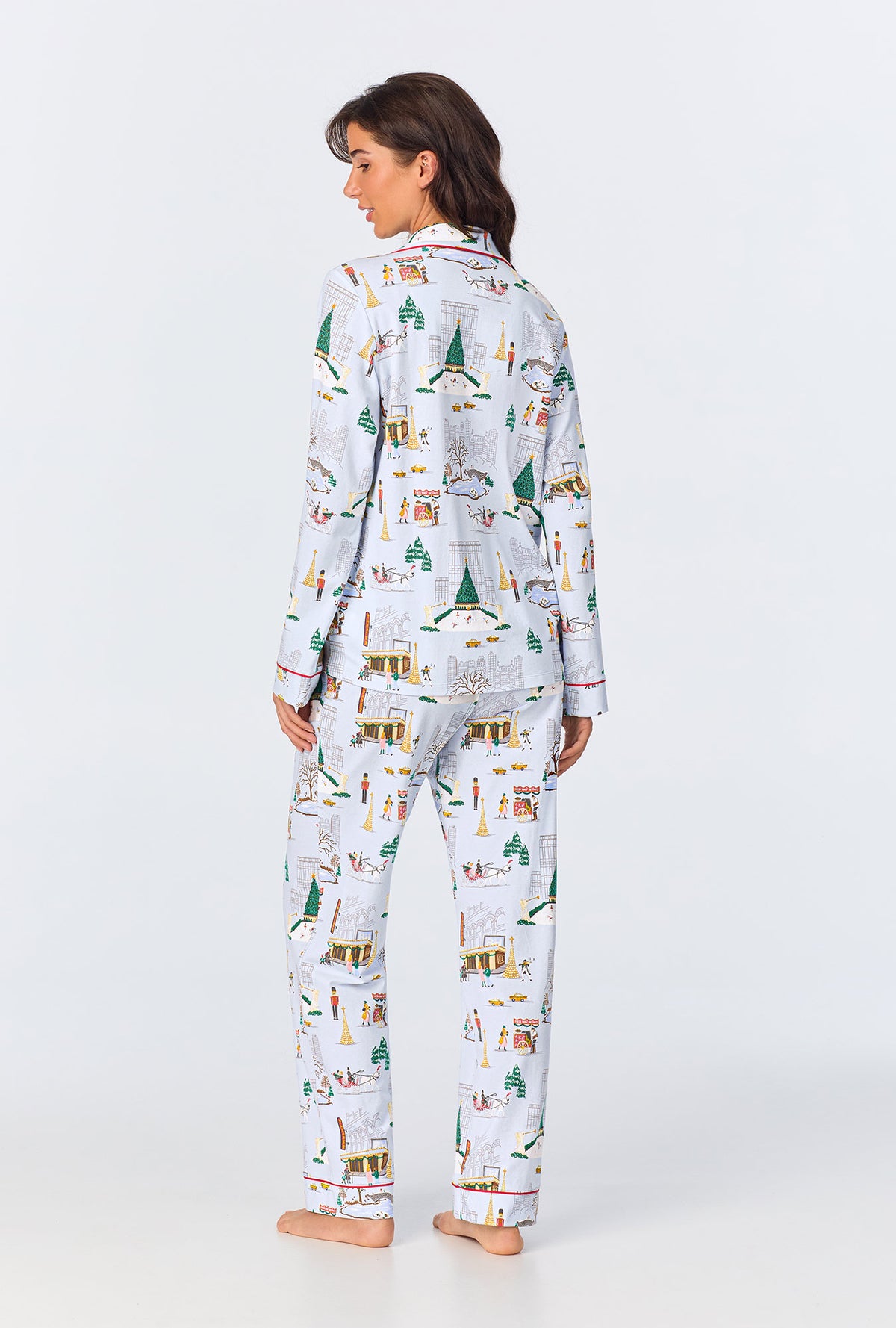 A lady wearing Holiday In The City Long Sleeve Classic Stretch Jersey PJ Set