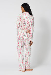 A Lady Wearing Fleur De La Tour Long Sleeve Classic Stretch Jersey Pj Set in a back view pose