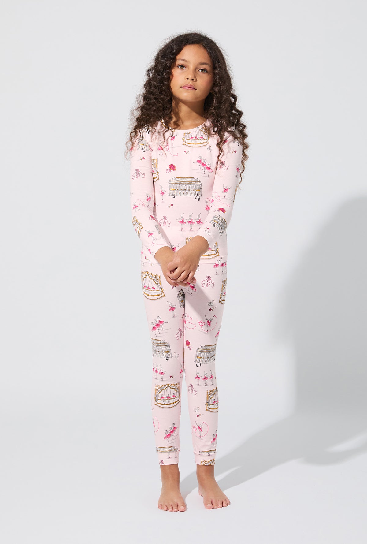 A girl wearing Swan Lake Long Sleeve Stretch Jersey Kids PJ Set