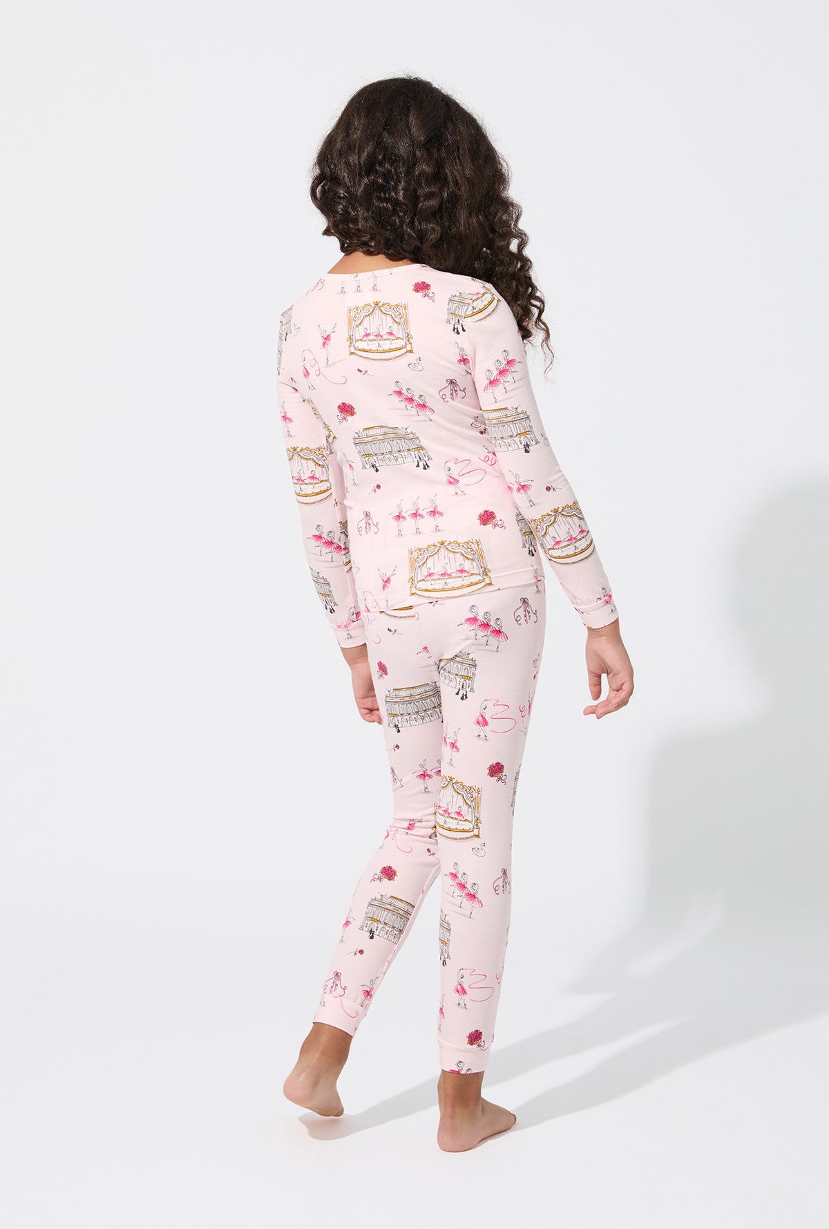 A girl wearing Swan Lake Long Sleeve Stretch Jersey Kids PJ Set