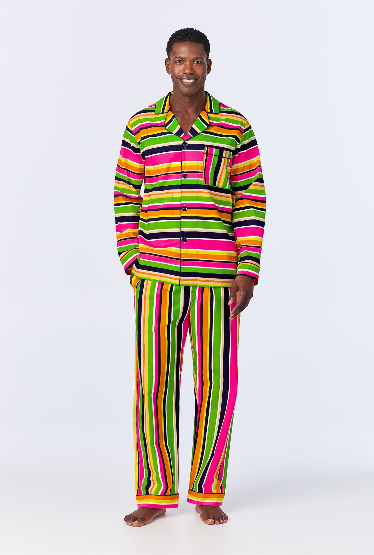 A man wearing BedHead x Mr. Turk Poolside Stripe Men&#39;s Long Sleeve Classic Woven Cotton Poplin PJ Set