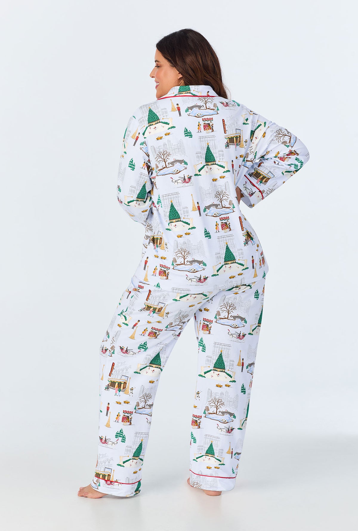 A lady wearing Holiday In The City Long Sleeve Classic Stretch Jersey PJ Set