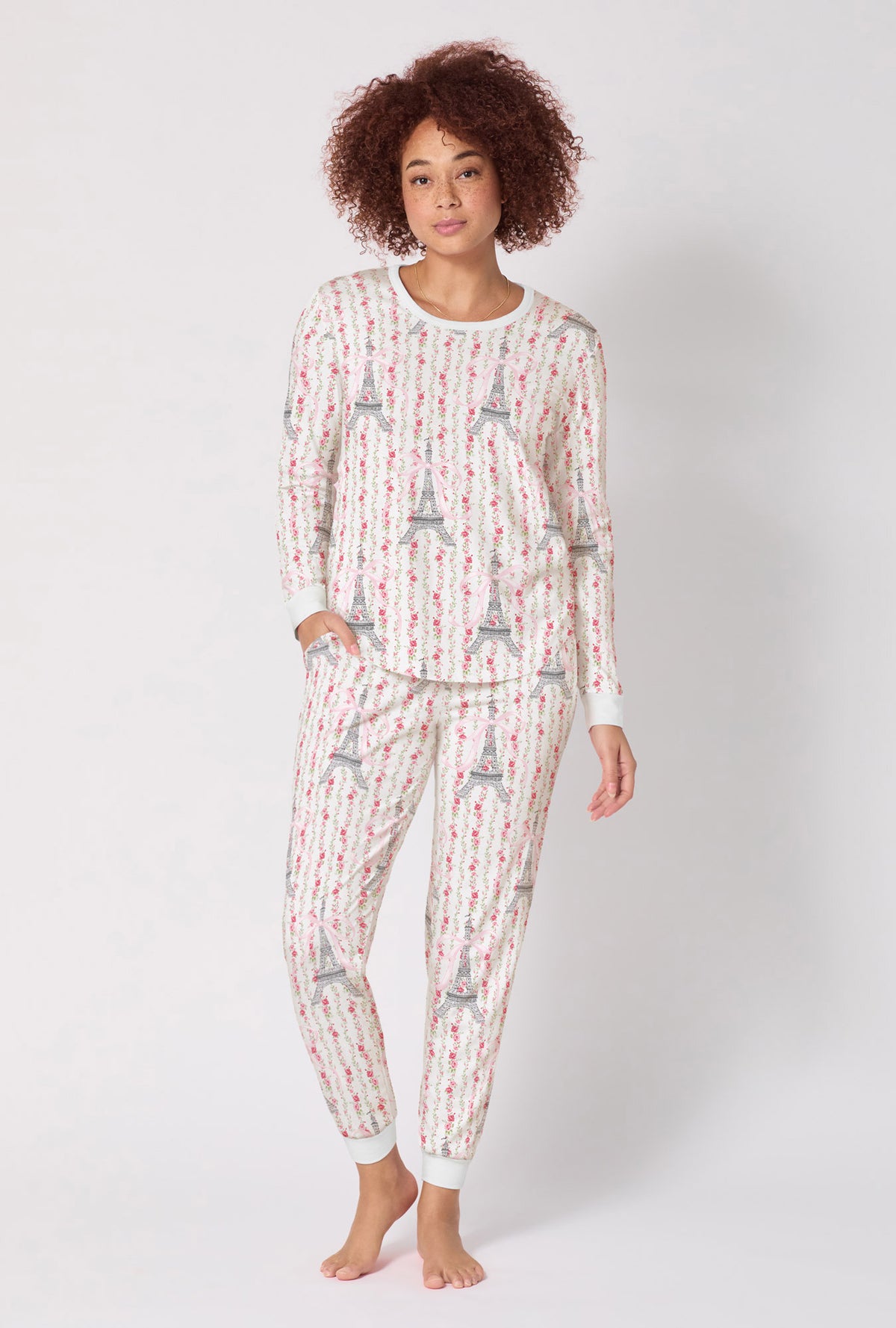 A Lady Wearing Fleur De La Tour Long Sleeve Pullover Crew And Jogger Stretch Jersey Pj Set in a front faced standing pose