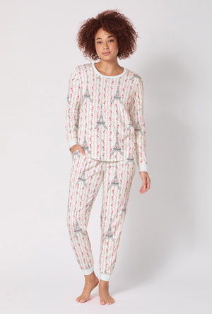 A Lady Wearing Fleur De La Tour Long Sleeve Pullover Crew And Jogger Stretch Jersey Pj Set in a front faced standing pose