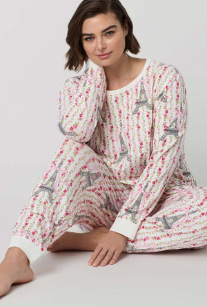 A Lady Wearing Plus Size Fleur De La Tour Long Sleeve Pullover Crew And Jogger Stretch Jersey Pj Set in a sitting close up shot