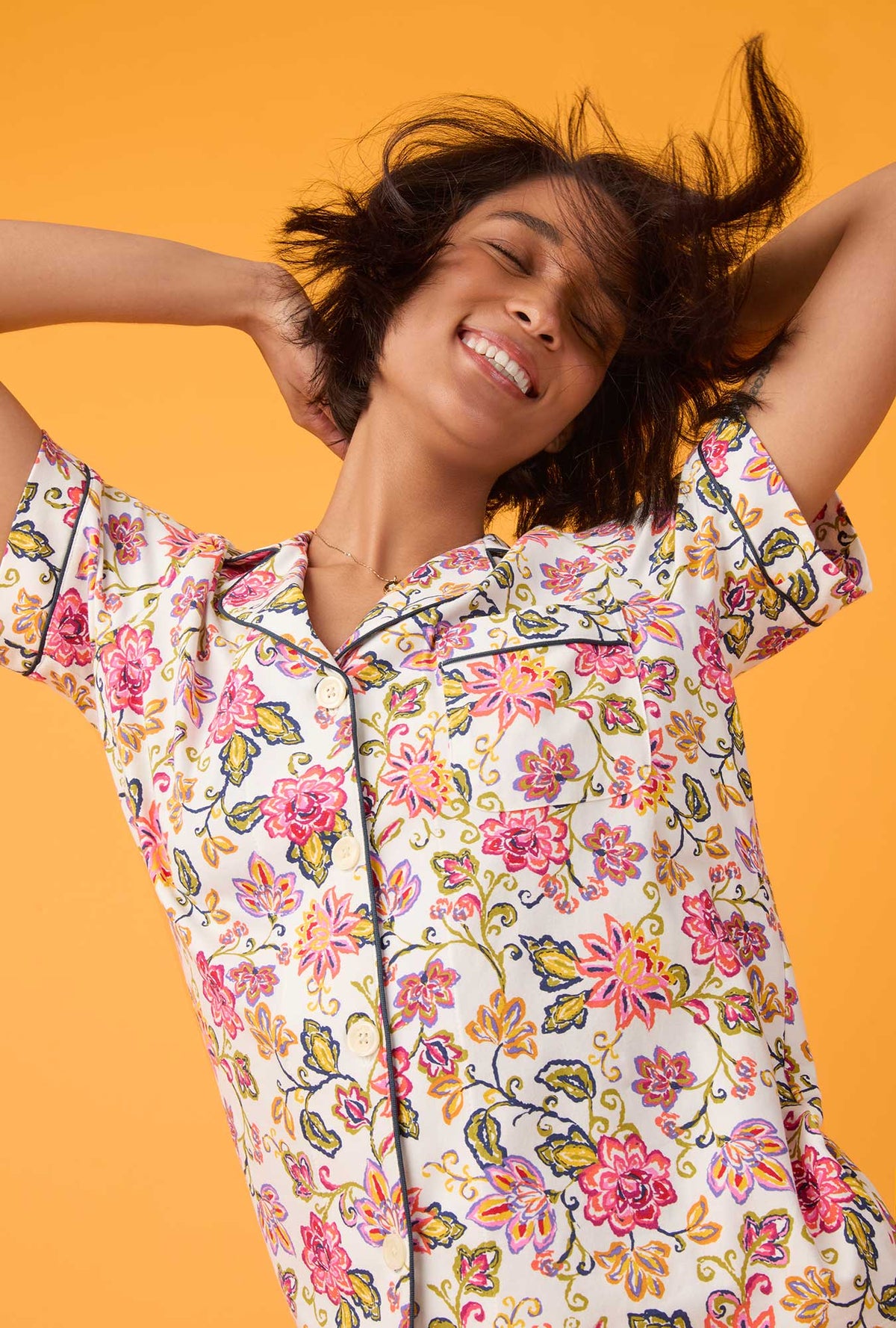 A lady wearing short sleeve Classic Shorty Stretch Jersey PJ Set with desert flowers print