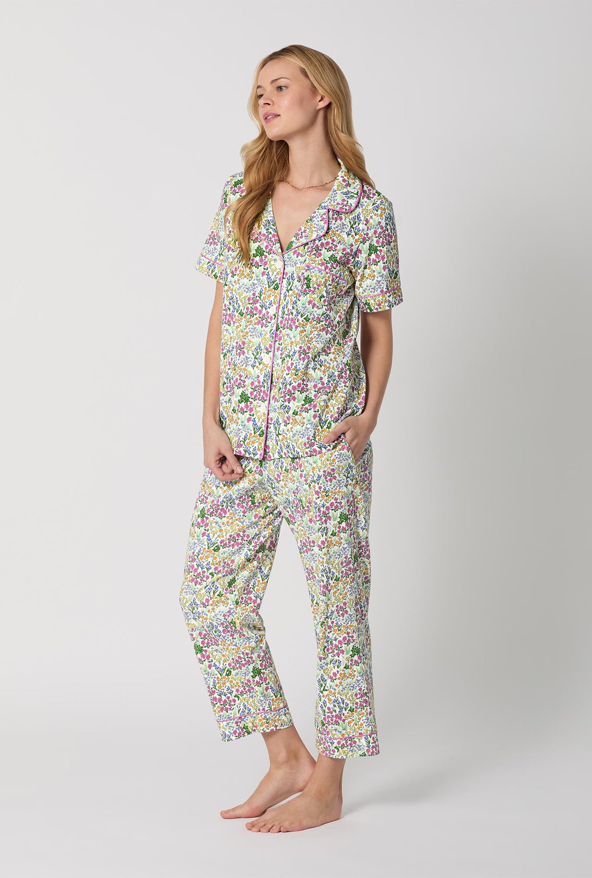 A Lady Wearing Multi Color Short Sleeve Classic Stretch Jersey Cropped PJ Set with Cottage Garden Print Side Angle View