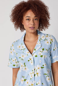 A lady wearing Magnolia Breeze Short Sleeve Classic Stretch Jersey Cropped Pj Set
