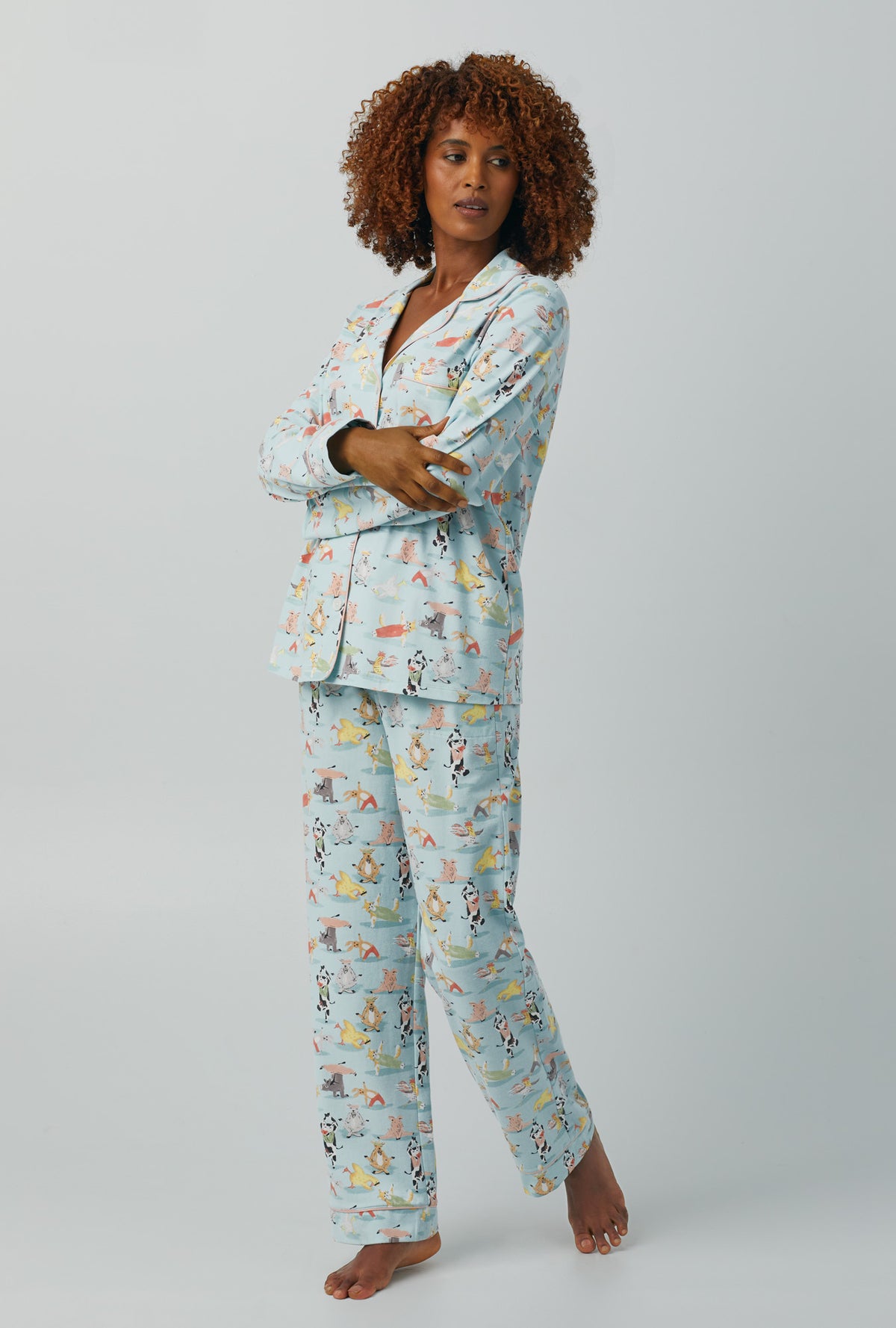 A lady wearing Long Sleeve Classic Stretch Jersey PJ Set with barnyard retreat print