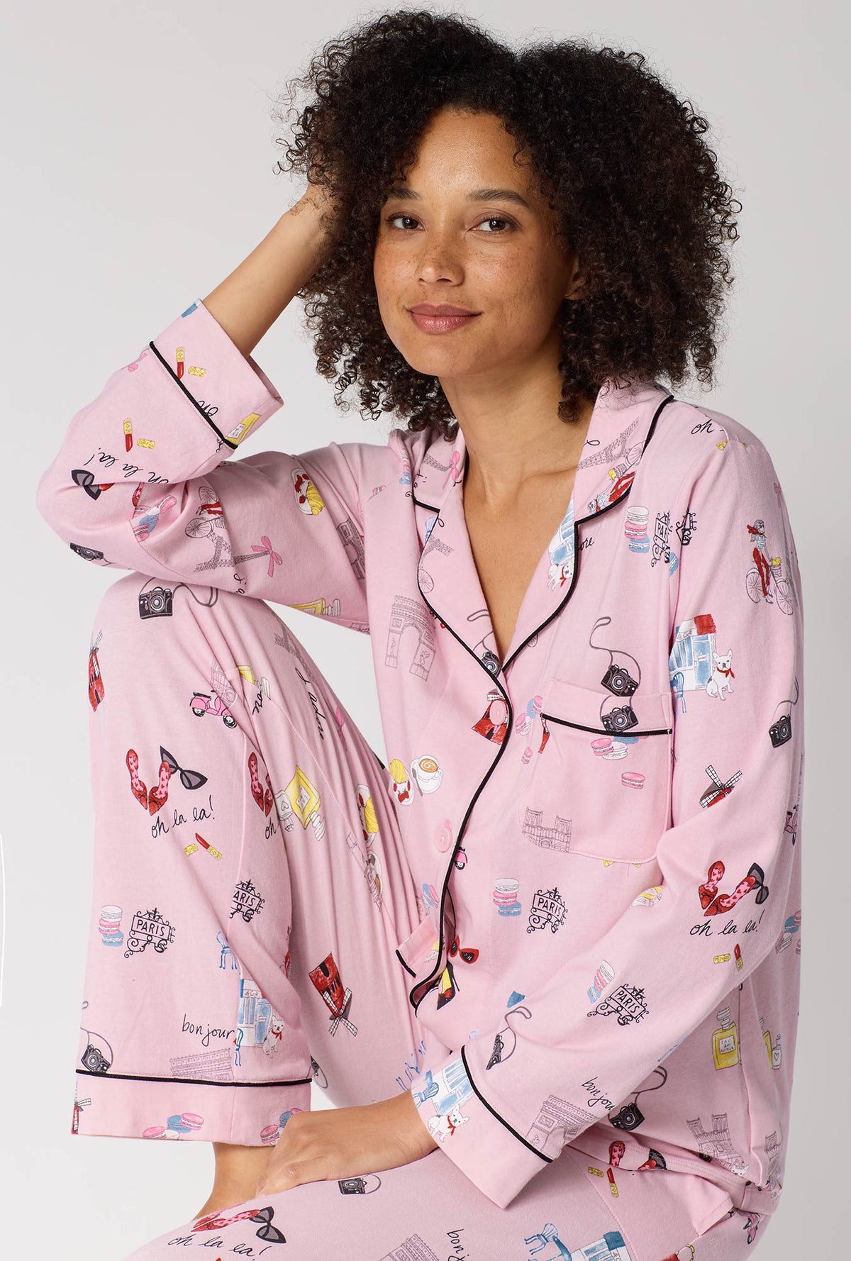 A Lady Wearing J'adore Paris Long Sleeve Classic Stretch Jersey Pj Set in a front facing sitting pose