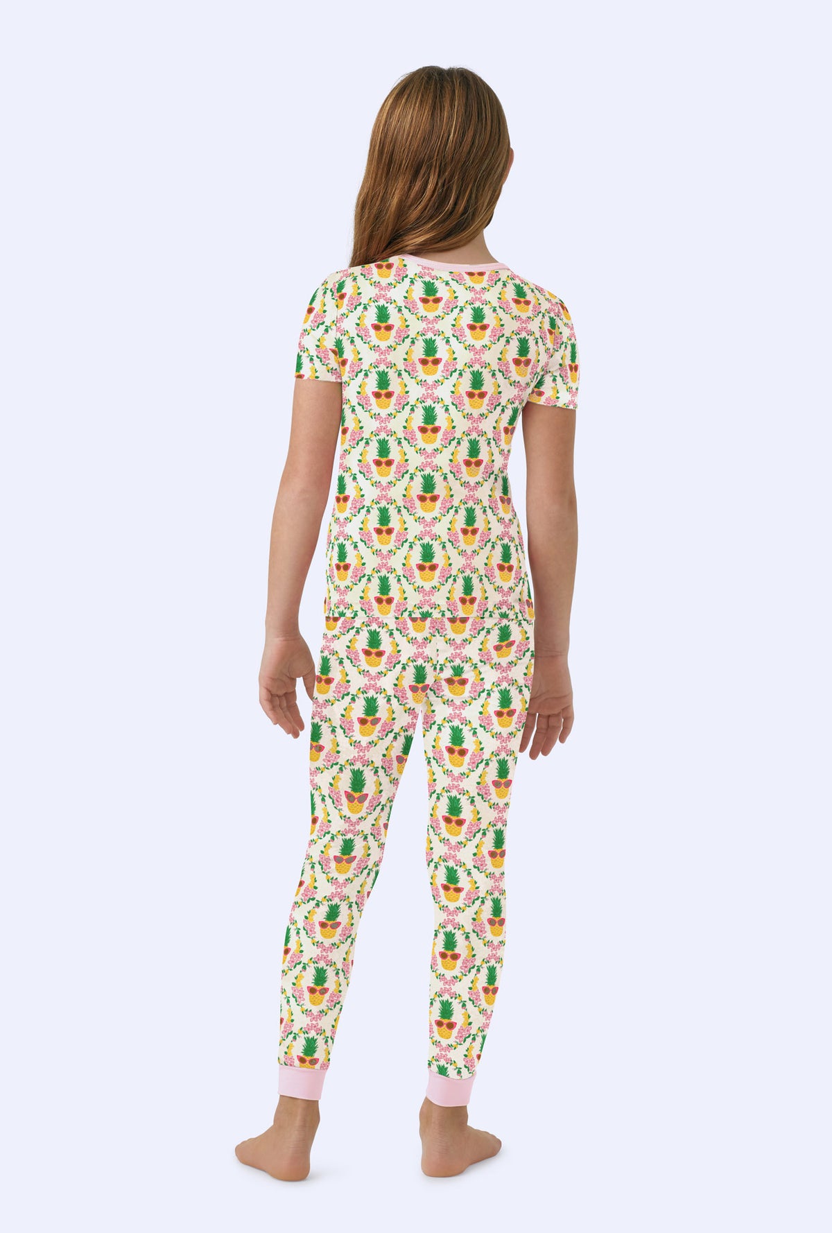 A girl wearing Pinacoolada Short Sleeve Stretch Jersey Kids PJ Set
