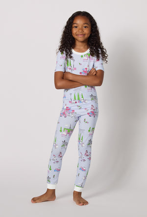 A Girl Wearing Belle Vie Short Sleeve Stretch Jersey Kids Pj Set in a standing pose