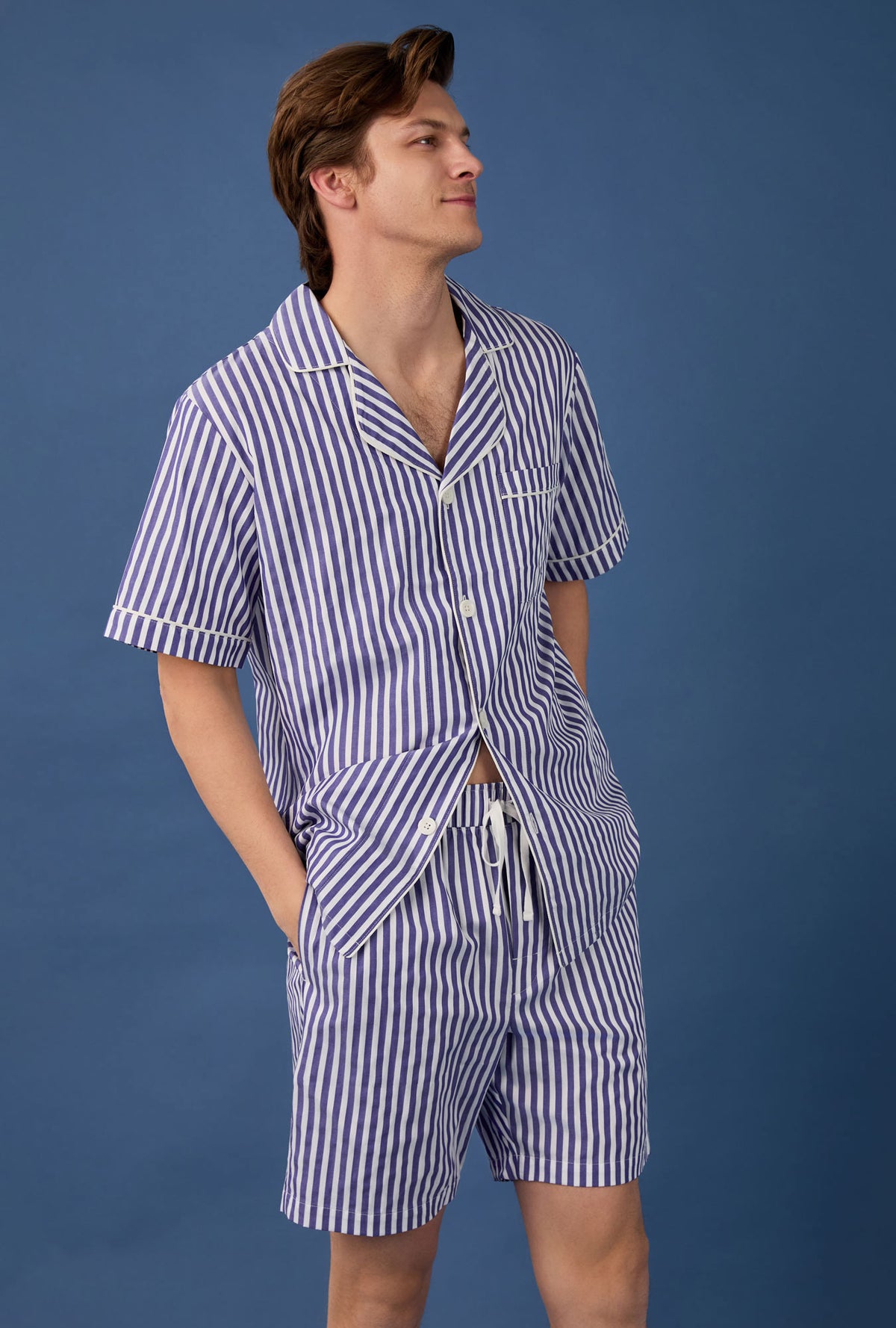 A man wearing Navy 3D Stripe Men&#39;s Short Sleeve Notch Woven Cotton Sateen Boxer PJ Set