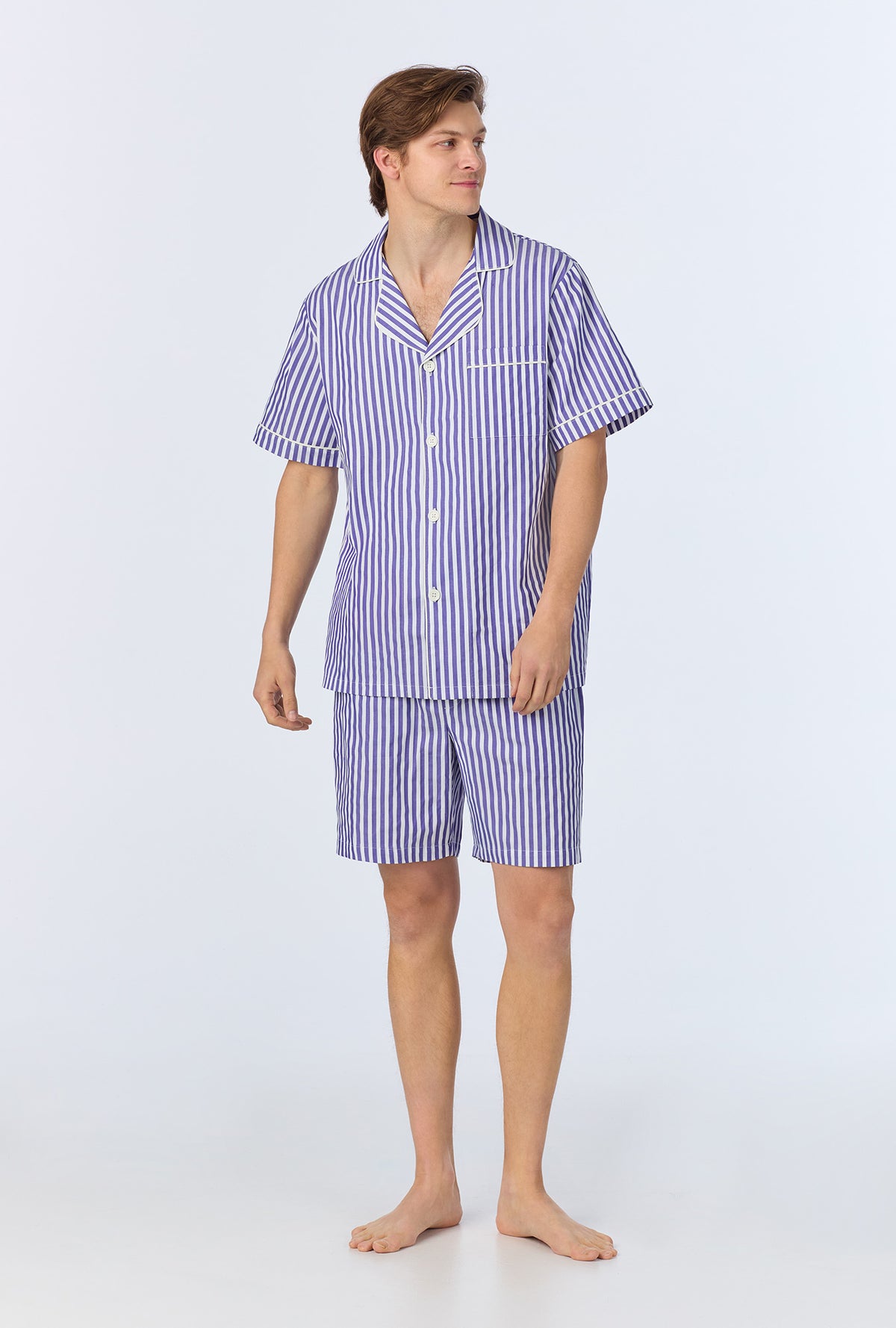 A man wearing Navy 3D Stripe Men&#39;s Short Sleeve Notch Woven Cotton Sateen Boxer PJ Set