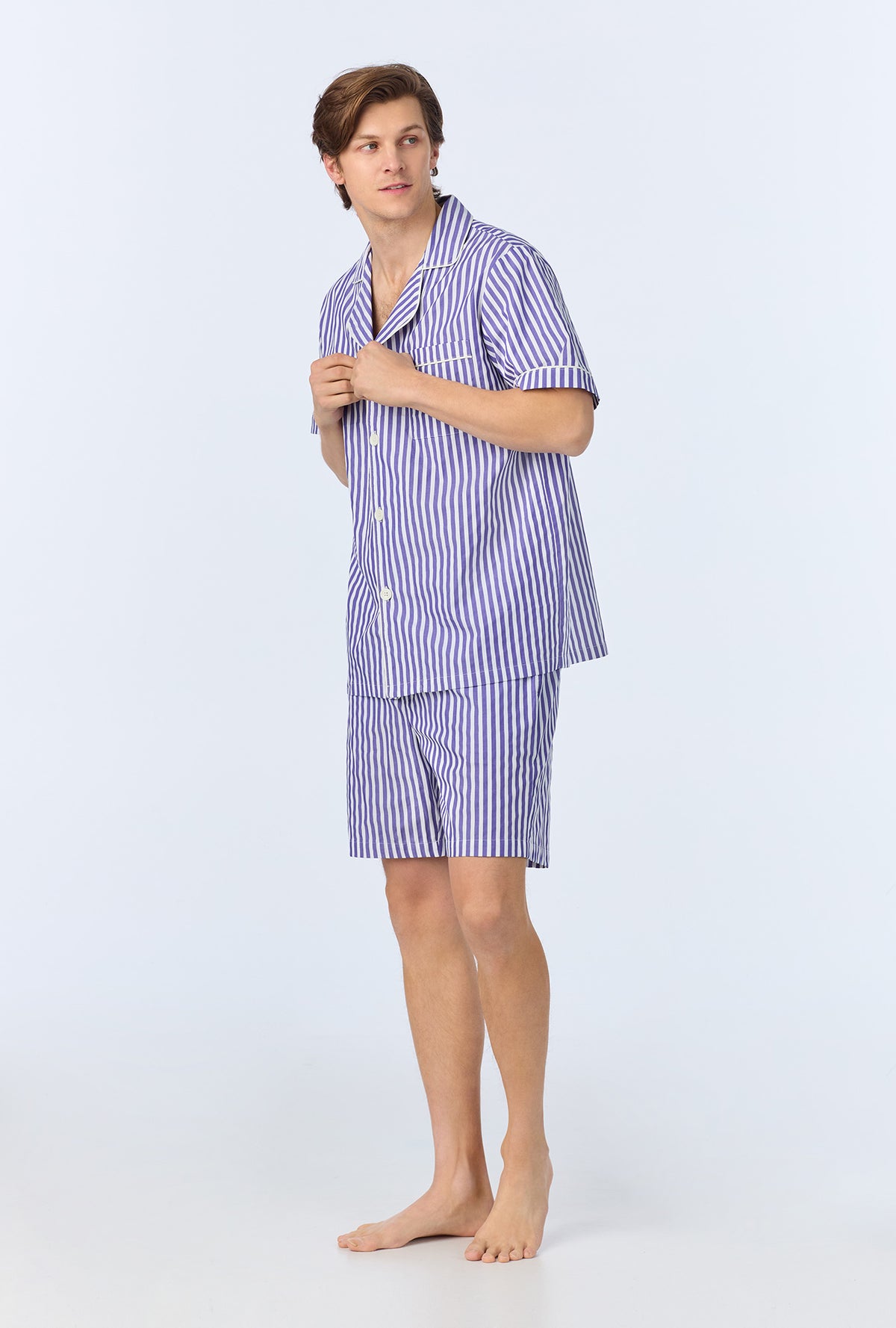 A man wearing Navy 3D Stripe Men&#39;s Short Sleeve Notch Woven Cotton Sateen Boxer PJ Set