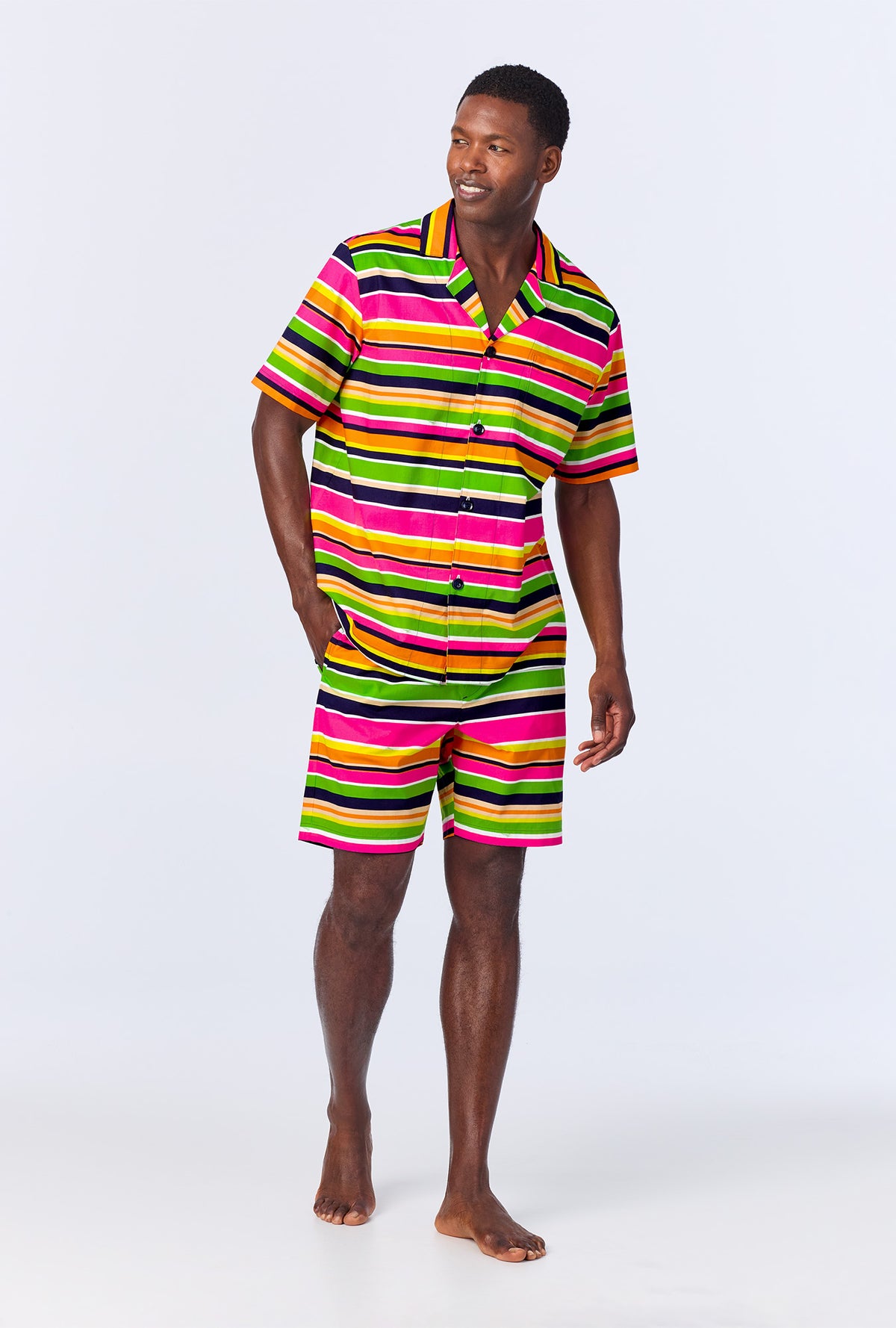 A man wearing BedHead x Mr. Turk Poolside Stripe Men&#39;s Sleeve Notch Woven Cotton Poplin Boxer PJ Set