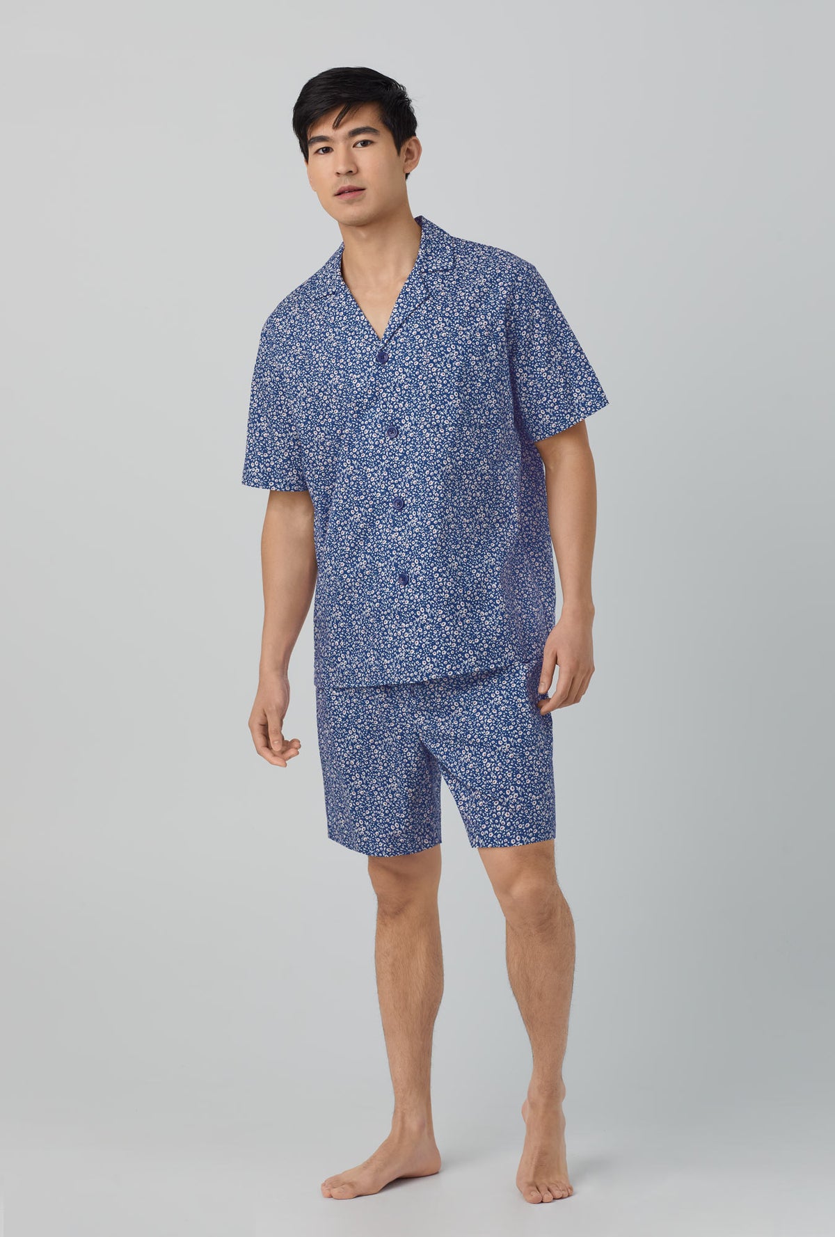 A men wearing blue Short Sleeve Notch Woven Cotton Poplin Boxer PJ Set with Sprout print