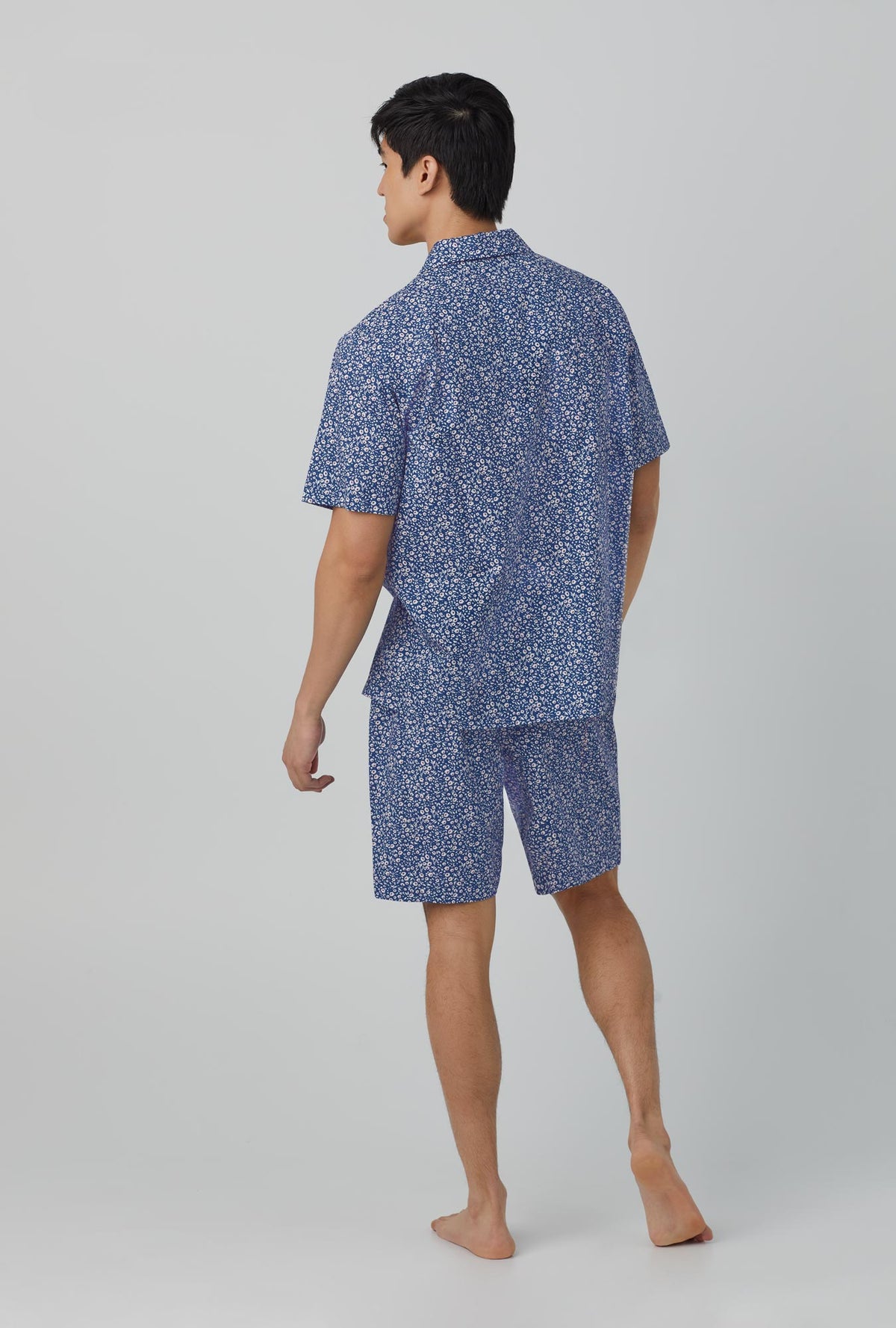 A men wearing blue Short Sleeve Notch Woven Cotton Poplin Boxer PJ Set with Sprout print