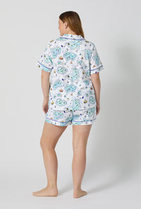 A lady wearing plus size Treasure Hunt Short Sleeve Classic Shorty Stretch Jersey Pj Set back view