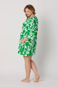 A lady wearing plus size Green and  White Stretch Jersey Sleep Dress back view