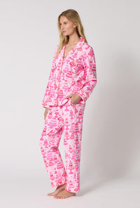 A Lady Wearing Cake Shop Long Sleeve Classic Stretch Jersey Pj Set in a side pose