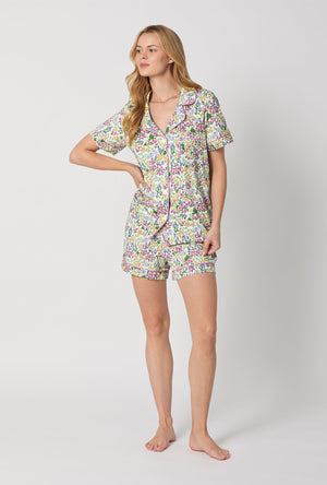 A Lady Wearing Multi Color Short Sleeve Classic Shorty Stretch Jersey PJ Set with Cottage Garden Print Front View