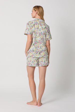 A Lady Wearing Multi Color Short Sleeve Classic Shorty Stretch Jersey PJ Set with Cottage Garden Print Back View