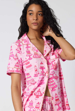 A Lady Wearing Cake Shop Short Sleeve Classic Stretch Jersey Cropped Pj Set facing front in a half close up shot