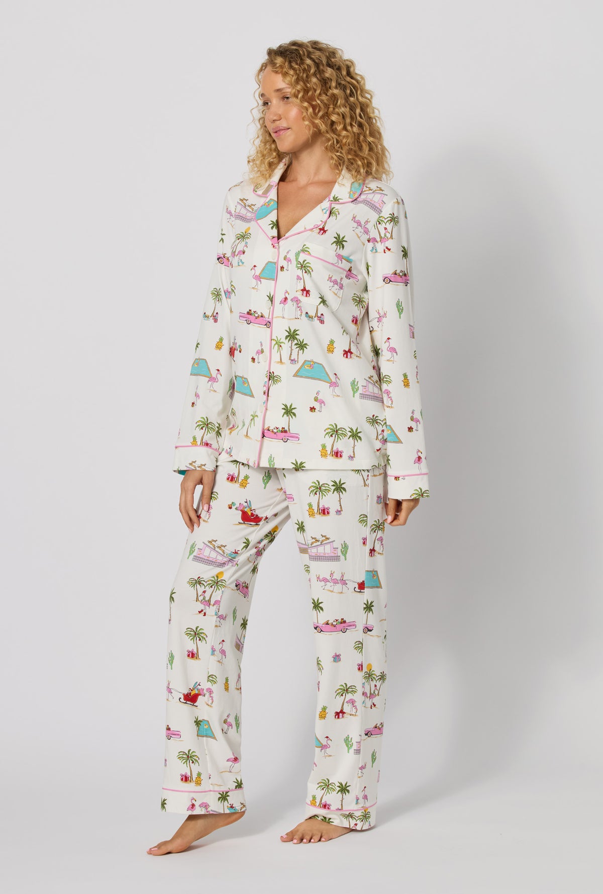 A lady wearing Festive Flamingos Long Sleeve Classic Stretch Jersey Pj Set looking side