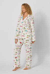 A lady wearing Festive Flamingos Long Sleeve Classic Stretch Jersey Pj Set looking side