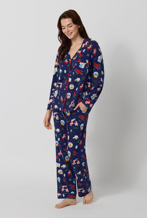 A lady wearing Nordic Nights Long Sleeve Classic Stretch Jersey Pj Set looking down