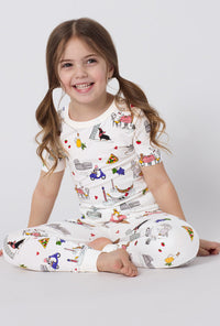 A girl sitting wearing White Short Sleeve Stretch Jersey Kids Pj Set front view