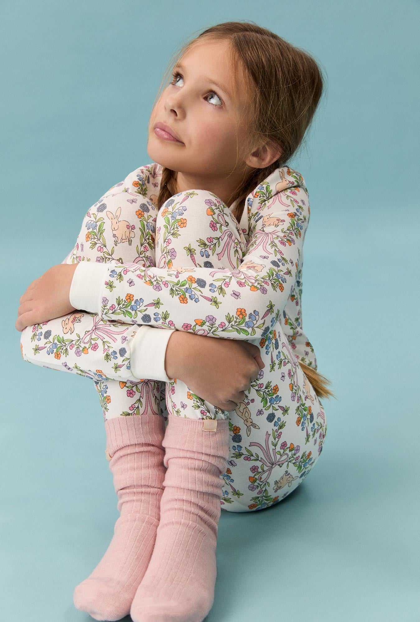 A girl wearing Bunny Blooms Long Sleeve Stretch Jersey Kids Pj Set