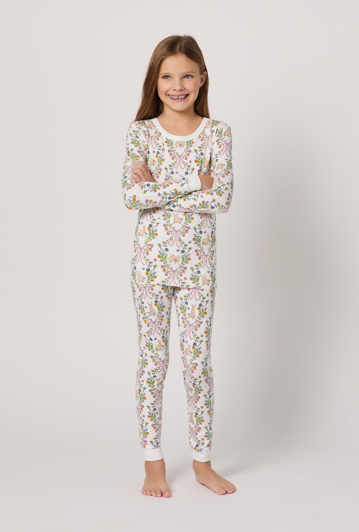A girl wearing Bunny Blooms Long Sleeve Stretch Jersey Kids Pj Set